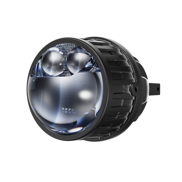 Close-up of AES FX-3 blue lens fog light showing dual laser optics